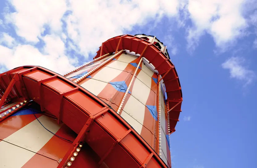 Red and Cream tower with slide wrapping around