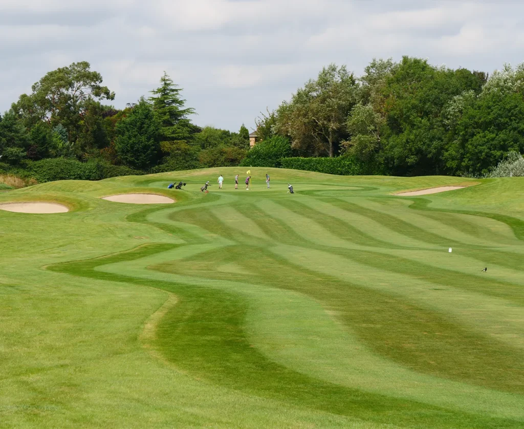 Group putting close to hole