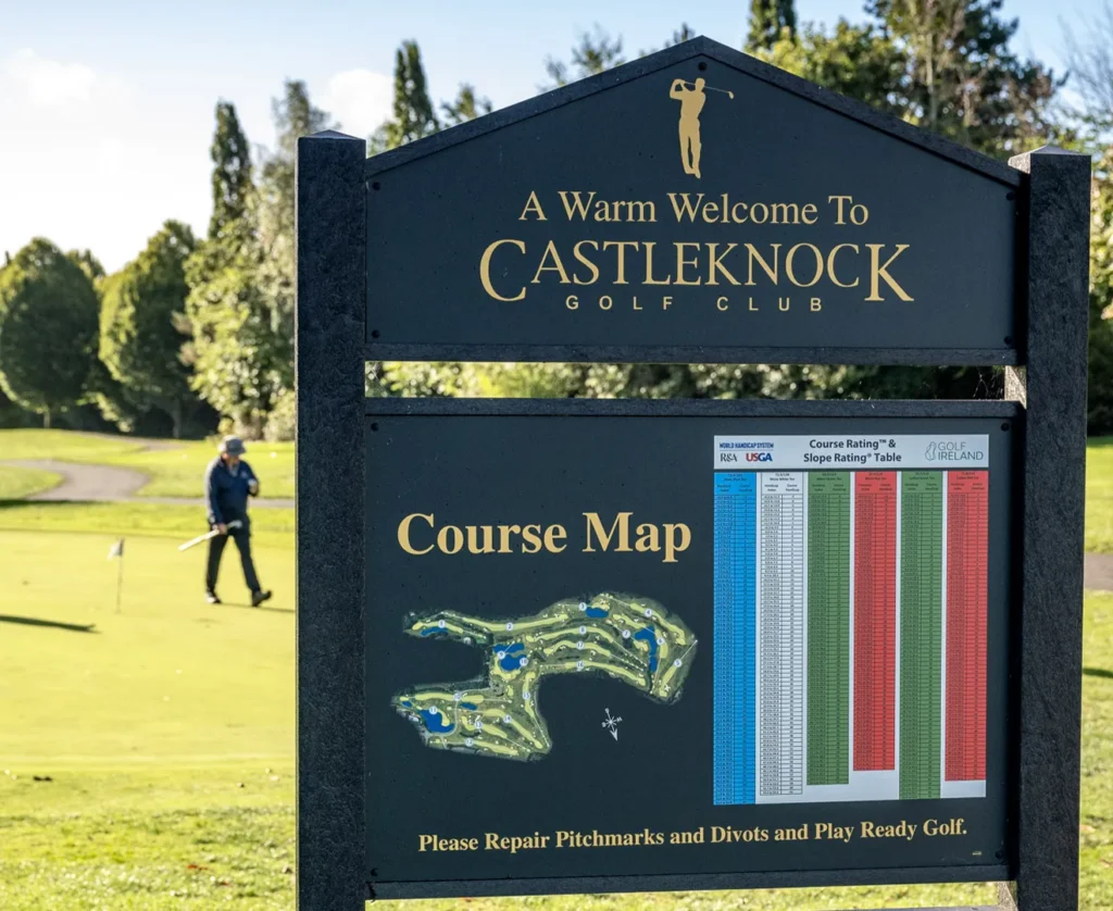 Welcome sign at castleknock with someone walking in background